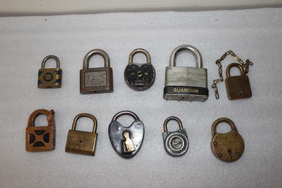 10 assorted vintage padlocks