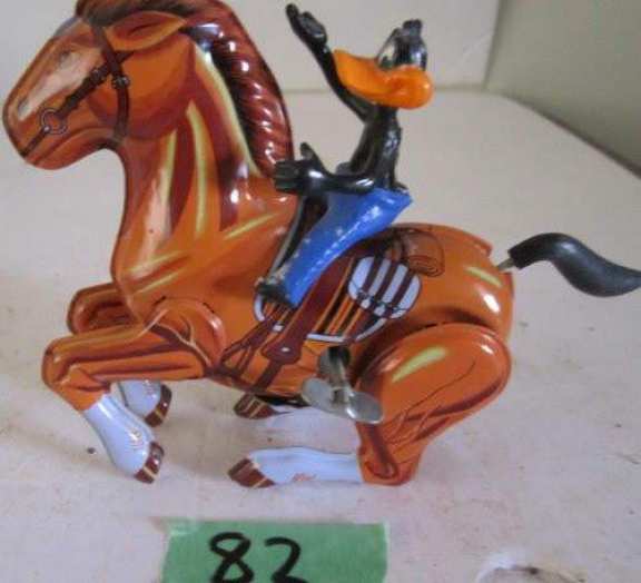 Mechanical wind-up bucking horse