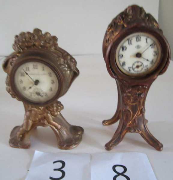 2 bronze novelty clocks