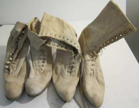 2 pair vintage high-topped shoes