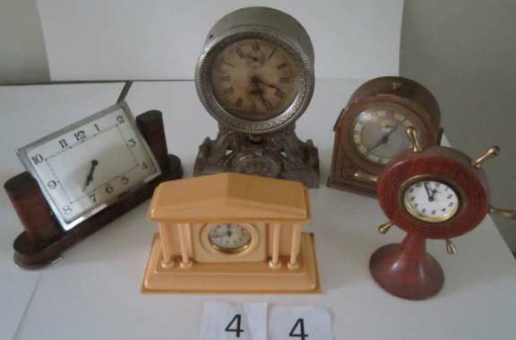 5 assorted clocks