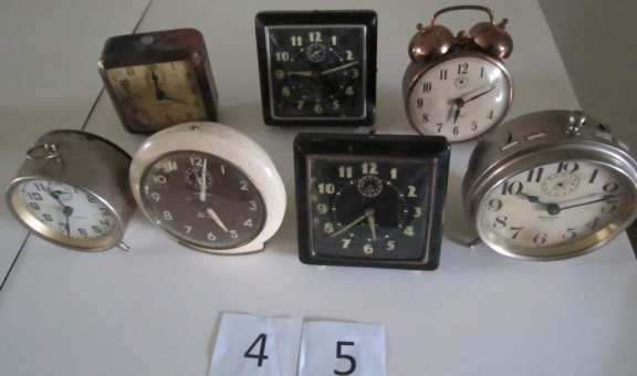 7 assorted alarm clocks