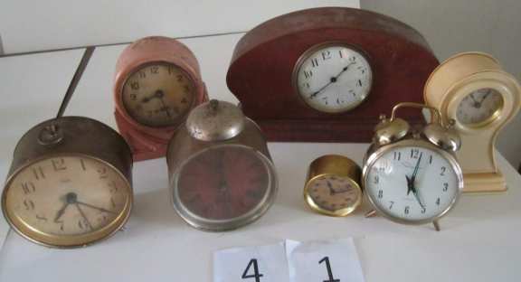 7 assorted clocks