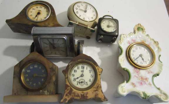 7 assorted clocks