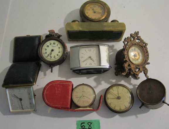 8 assorted clocks